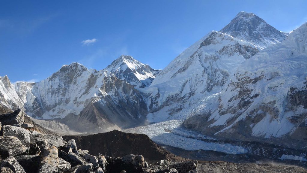 The picture features a majestic white mountain, with Kala Patthar visible at its base.